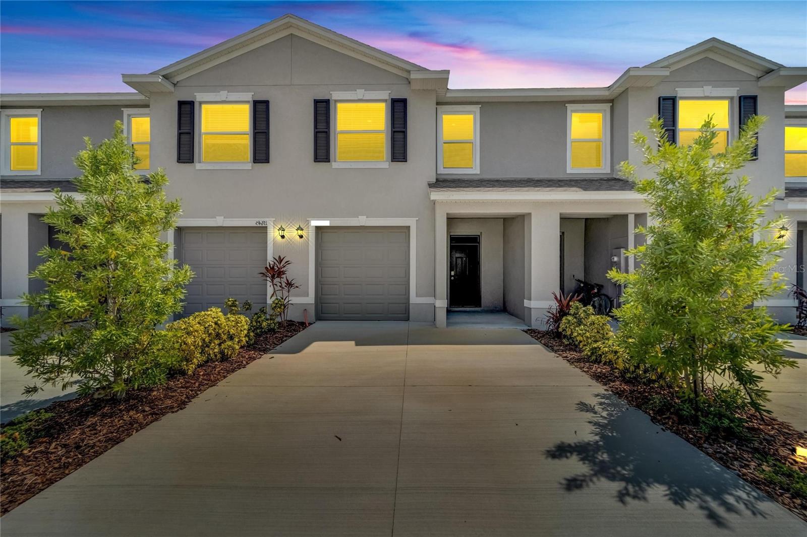 1 Month Free with an 18-Month Lease!
Discover modern luxury living in the heart of Lakewood Ranch with this stunning, brand-new three-bedroom, two-and-a-half-bath townhome located in the desirable Star Farms community. Available for lease starting November 1, this home offers an inviting open-concept layout that seamlessly connects the kitchen, dining, and living areas. The kitchen is beautifully appointed with granite countertops, stainless steel appliances, and ample cabinetry, combining both elegance and practicality.
Step outside to the screened-in lanai and enjoy tranquil water views—the perfect spot for morning coffee or evening relaxation. Upstairs, you’ll find a thoughtfully designed split floor plan, complete with a convenient in-unit washer and dryer. Additional highlights include a one-car garage and a double driveway for extra parking.
Star Farms residents enjoy access to an array of resort-style amenities, including multiple pools, fitness centers, a clubhouse, dog park, tennis and basketball courts, pickleball, splash pad, cornhole, outdoor cabanas, and scenic walking trails.
Experience a lifestyle of comfort, convenience, and recreation in one of Lakewood Ranch’s most sought-after communities. Contact us today to schedule your private tour and make this beautiful home yours!