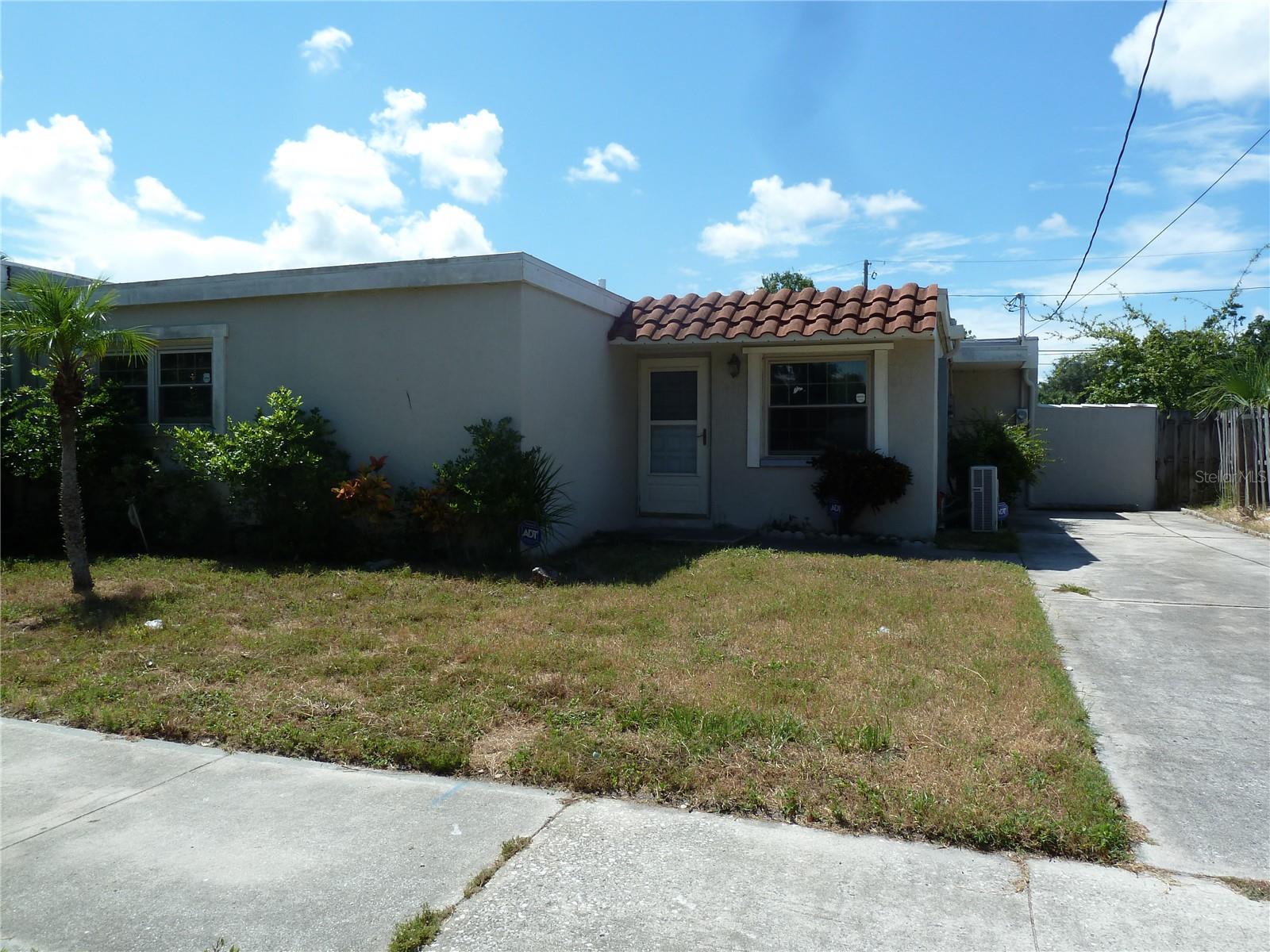 Looking for a place with potential (and a little personality)? This 2-bedroom, 1-bath Clearwater cutie is ready for its next chapter. Yes, she’s a fixer-upper but with a little love and a lot of elbow grease, you’ll be the proud owner of a home just 10 minutes from world famous Clearwater Beach. Talk about location goals.
The electricity is currently off, so think of showings as a daylight adventure. Bonus points: you’re right next door to a church (Sunday commute = basically zero) and just a short stroll from the park when you need fresh air or a reset. Even better? No HOA fees to boss you around and it’s not in a flood evacuation zone. Florida living without the extra drama.
This isn’t just a house, it’s a blank canvas with a zip code that screams opportunity. Whether you’re dreaming of your own Florida retreat or an investment project, this one’s ready to make it happen. Roof was done in 2018 and AC in 2021.
Bring your imagination (and maybe a flashlight) your next great project awaits! Come see it today!