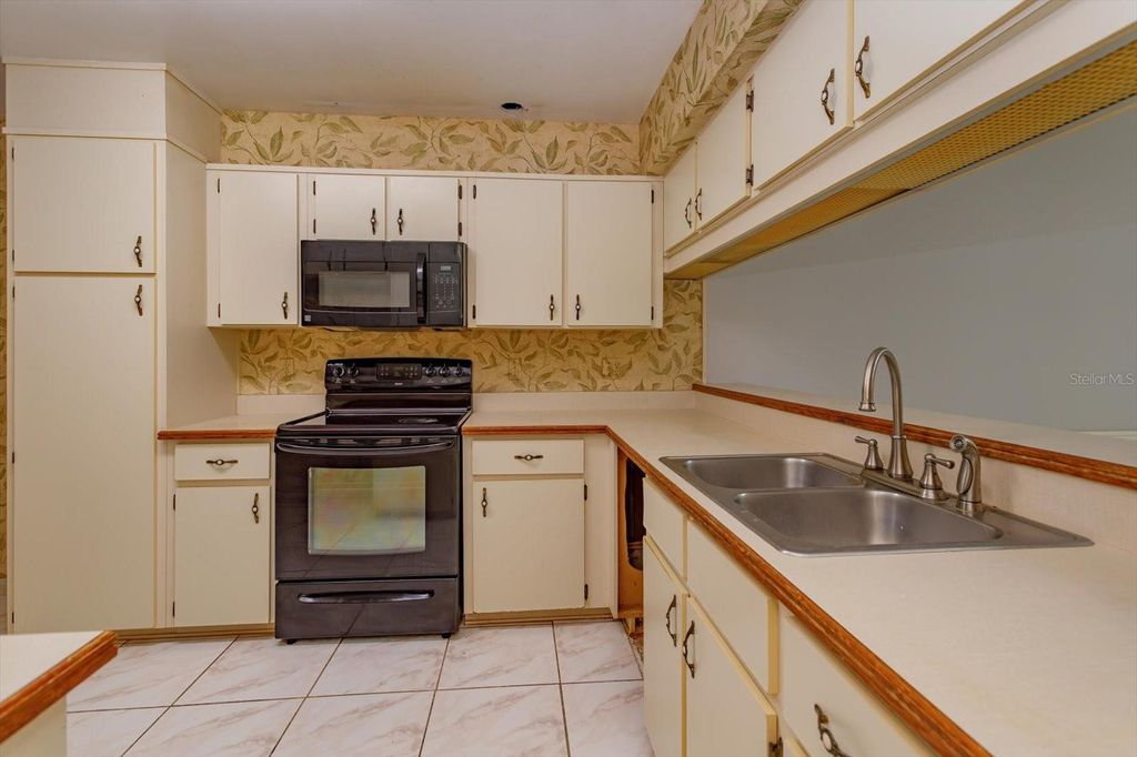 Photo of 8266 Ambrose Cove Way, Orlando, FL 32819 (MLS # O6406172)