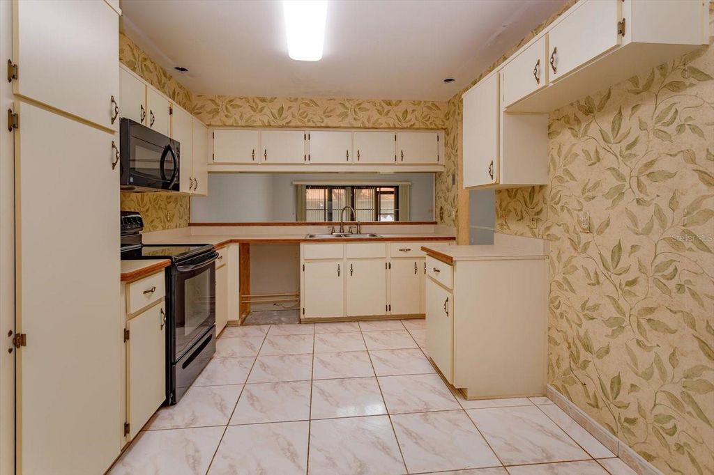 Photo of 8266 Ambrose Cove Way, Orlando, FL 32819 (MLS # O6406172)
