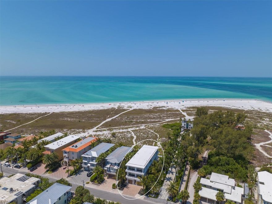 JUST COMPLETED! BRAND NEW CONSTRUCTION!!! Gulf Front Luxury Living is at its Absolute Best in this Exquisite Estate in the Heart of Anna Maria! It will be love at first sight when you enter this stunning FULLY FURNISHED 5 Bedroom, 5.5 Bathroom Gulf Front Estate. This home has it all including endless views of The Gulf of Mexico. With over 4,936 square feet under air, this home features Control 4 smart home automation, expansive living spaces with custom, designer finishes, in-ceiling speakers, custom built-ins and motorized Lutron blinds throughout. Take the master staircase or commercial-grade elevator to the open-concept, main living area which features an oversized, luxurious living room with views of the crystal blue waters of the Gulf as you look out through the floor-to-ceiling, pocket sliding doors containing the highest quality windows. The main living level also features a gorgeous Gulf front dining room, detailed gourmet chef's kitchen featuring Sub Zero and Wolf appliances, separate walk-in pantry, conversation full bar sitting area with a walk-in and a custom outdoor kitchen on the lanai. Then, continue up the grand staircase to your private hideaway master suite which includes an oversized bedroom, sitting and lounge area, balcony, walk-in designer closet, large designer bath area with spectacular finishes and, of course, more amazing Gulf views! This floor also features two additional guest suites.  On the ground level, the expansive Gulf-front swimming pool and enormous surrounding deck offers significant, additional entertaining space. Professional landscaping placed with privacy in mind, a 4-car garage and a paved driveway with plenty of room for both owner and guest vehicles. All of this and you are a short stroll from the shops and restaurants of Pine Avenue. Call me today to make your dream of owning an exquisite, luxurious Gulf-front Estate a reality!