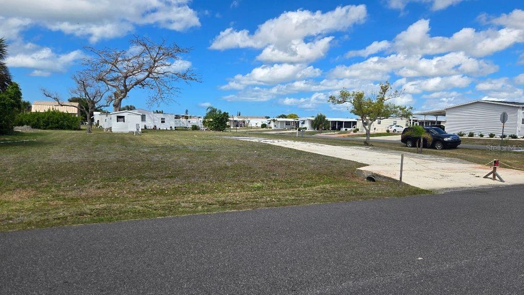 Photo of 1464 Blue Heron Drive, Englewood, FL 34224 (MLS # D6146876)