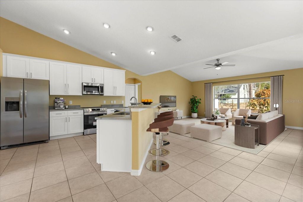 Photo of 619 Rhodes Drive, Deland, FL 32720 (MLS # O6376600)