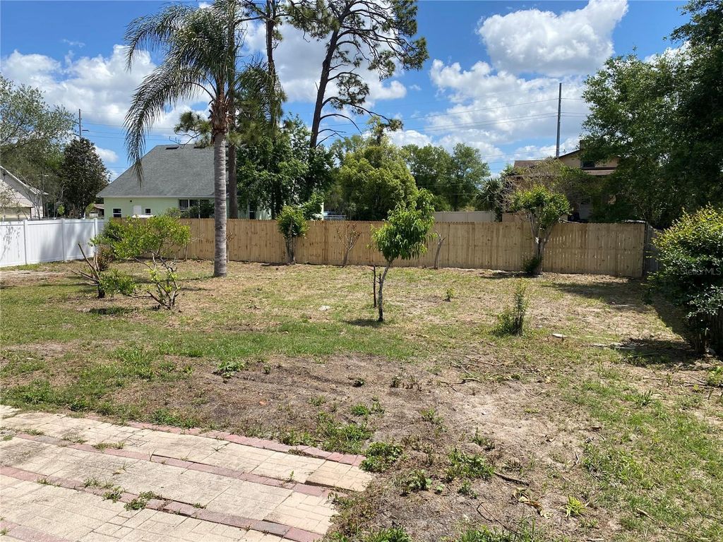 Photo of 619 Rhodes Drive, Deland, FL 32720 (MLS # O6376600)