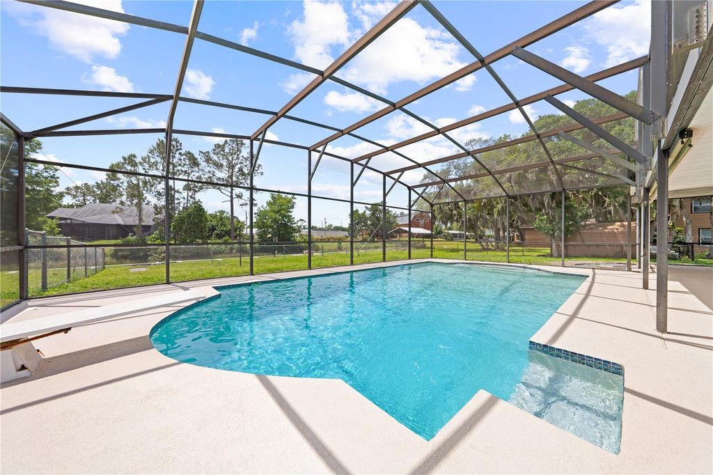 Photo of 6570 Bay Shore Drive, Saint Cloud, FL 34771 (MLS # S5148617)