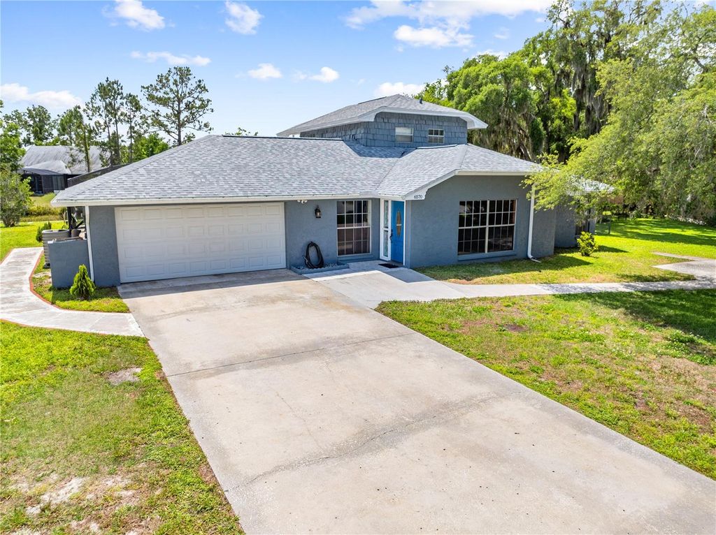 Photo of 6570 Bay Shore Drive, Saint Cloud, FL 34771 (MLS # S5148617)