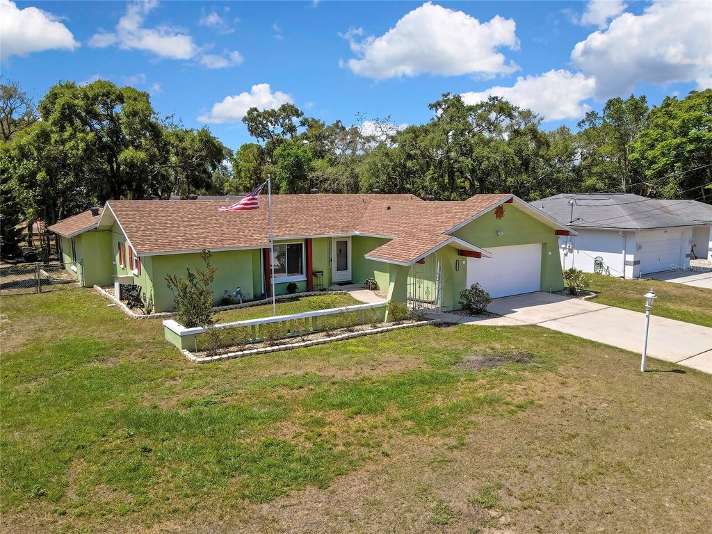 Photo of 6100 Piedmont Drive, Spring Hill, FL 34606 (MLS # W7885352)