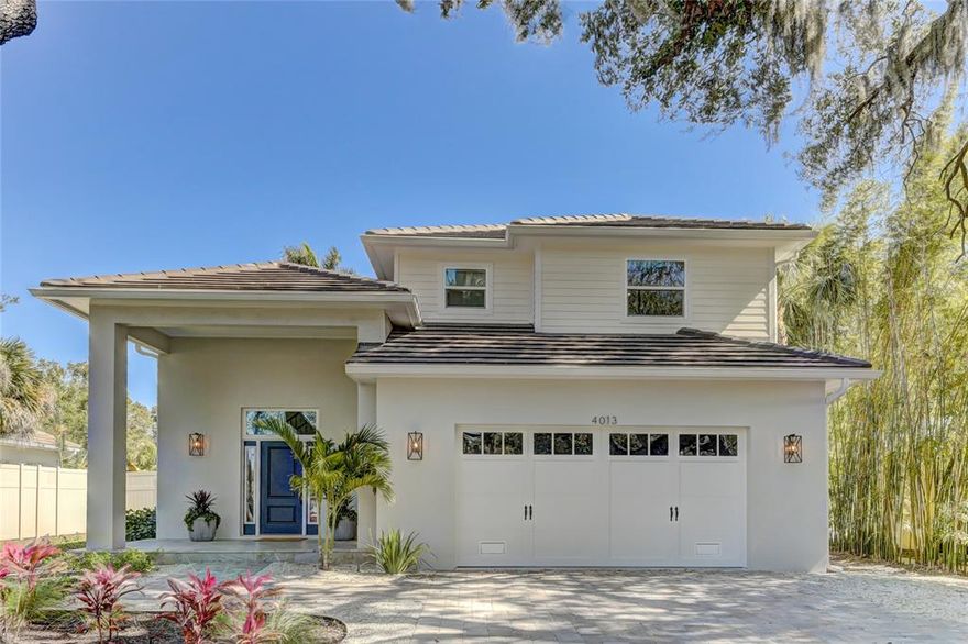 Welcome to this beautiful West of the Trail home located in the highly desirable Johnson Estates. This newly completed 4 bedroom, 3.5 bathroom coastal home has everything you've been looking for without the need to wait for construction to be complete. Enjoy soaring ceiling heights, a versatile floorplan, and high end finishes throughout the home including two primary bedrooms, wide plank flooring throughout, vaulted shiplapped ceilings, hurricane impact windows, and designer touches. Bask in Florida living year round in the enclosed backyard featuring a covered lanai with an outdoor kitchen overlooking the sparkling pool and beautiful tropical landscaping. A bird’s eye view illustrates the superb location near Siesta Key, Southside Village shops and restaurants, Sarasota Memorial Hospital, Sarasota Bay, and Sarasota’s arts restaurants and nightlife. A+ rated school districts without CDD or HOA fees make this a perfect location to call home. You won't want to miss out on this home!