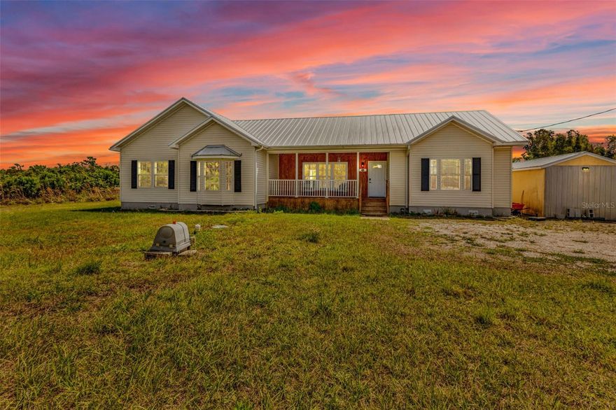 PRIVATE 2.5+/- Acre Remodeled Home in Punta Gorda! New Metal Roof (2023), flooring, kitchen, and so much more! No flooding or flood zone, No HOA, No Deed Restrictions! Zoned AG – bring your animals and toys! Open floor plan, natural light through expansive windows, high ceilings with crown molding. Front and back porch, perfect for rocking chairs and enjoying the peace and quiet that comes with country living. Spacious living areas that flow seamlessly from living room, to dining room and family room to the open kitchen – plenty of room for a furniture island. Brand NEW kitchen with granite countertops, stainless steel appliances, closet pantry, and single bowl farmhouse sink with a large window above to enjoy your natural backyard view. Primary ensuite bedroom with large walk-in closet, separate vanities, and walk-around shower. Wonderfully designed laundry/mudroom with built-in storage, cubbies and access to the outside. Split bedroom plan, both guest rooms are spacious with lots of closet storage. Storage shed, inside built-in safe, and corner cabinet – details that make this home special. Come live your best life in SW FL and take advantage of all the sunshine state has to offer with World Famous Fishing, Nature parks, Award-winning Golf Courses, and stunning beaches on the Gulf of Mexico! Conveniently located minutes from I-75, it is a quick 30-minute drive to Sarasota or Fort Myers. Charlotte County is home to the beautiful historic downtown Punta Gorda, Hilton Sunseeker Resort, and the Atlanta Braves and Tampa Bay Rays Spring Training Sports Parks! Don’t miss your opportunity to make this wonderful town YOUR hometown! *See Tour 1 for Virtual Walk Through*