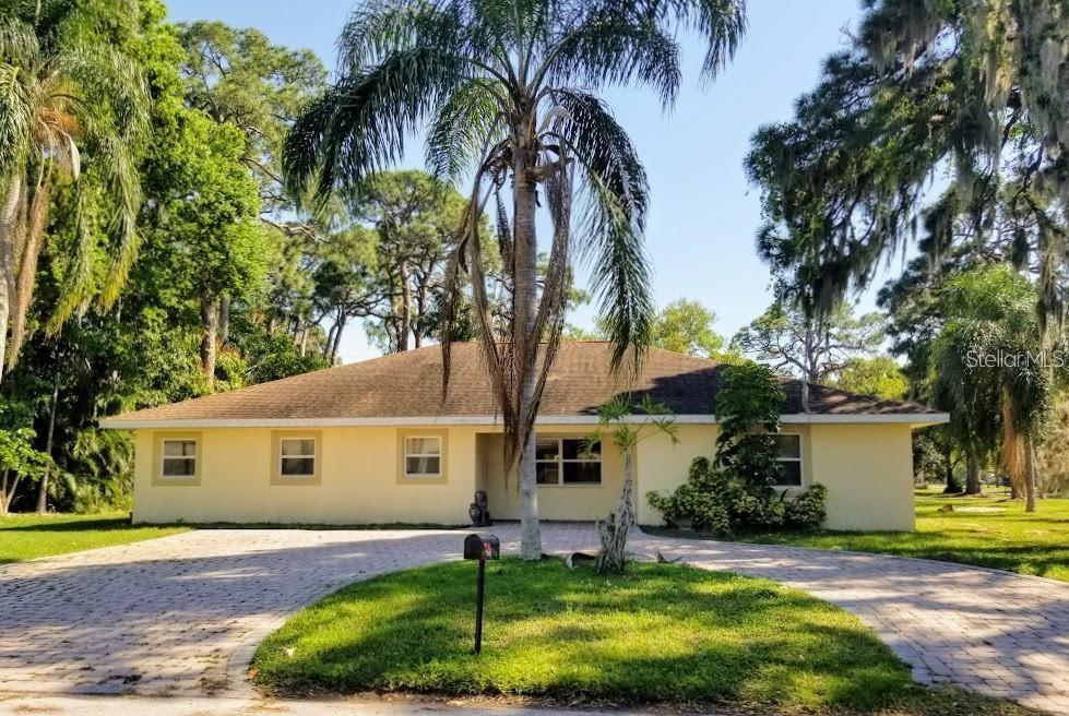 Location, Location, Location! Spacious 4-bedroom, 3-bathroom house with private fenced backyard located West of 41. Great neighborhood just minutes from beautiful Siesta Key Beaches and A rated schools. This family home features open floor plan, cathedral ceilings, kitchen with a lot of cabinets, gas stove, breakfast bar and granite counters, 2 bdrms on opposite sides of the home, and separate laundry room. Master bathroom comes with a double walk-in closets, double vanity, separate shower and tub. The backyard is fenced in with great yard space for all outdoor activities. Circular driveway, storage shed and extra-large outside storage room are a well-appreciated bonuses. The furniture and decorations are the tenant’s property and photos are from the time before it was last rented. Newer A/C and refrigerator. First and last month rent plus reservation/damaged deposit is required to move in. Lawn service and gas for cooking is included in rent. Available starting July 1st, 2025; unfurnished, subject to application approval with $ 75 fee.