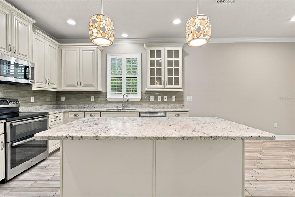 Photo of 8021 Whitetail Deer Way, Tampa, FL 33635 (MLS # TB8548837)