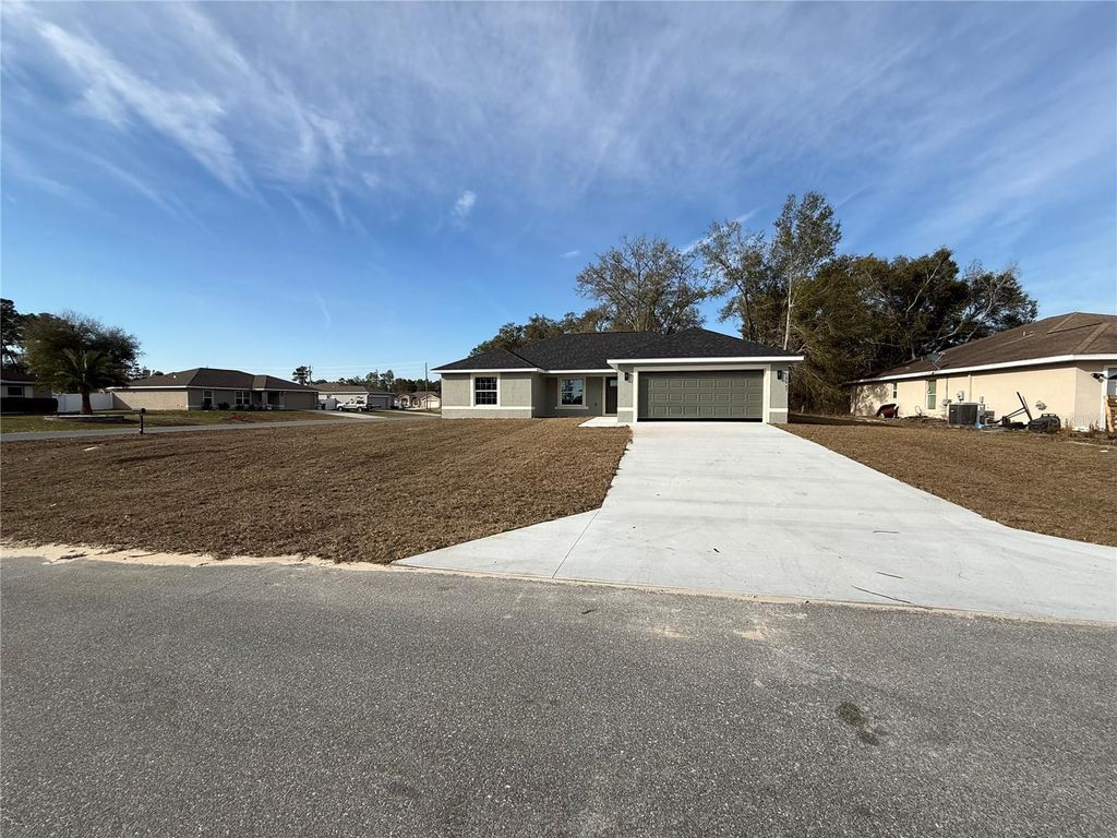 Photo of 5447 SW 129th Place, Ocala, FL 34473 (MLS # OM719565)
