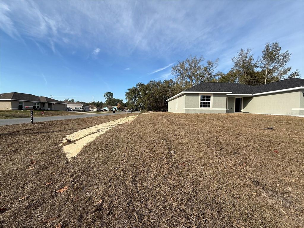 Photo of 5447 SW 129th Place, Ocala, FL 34473 (MLS # OM719565)