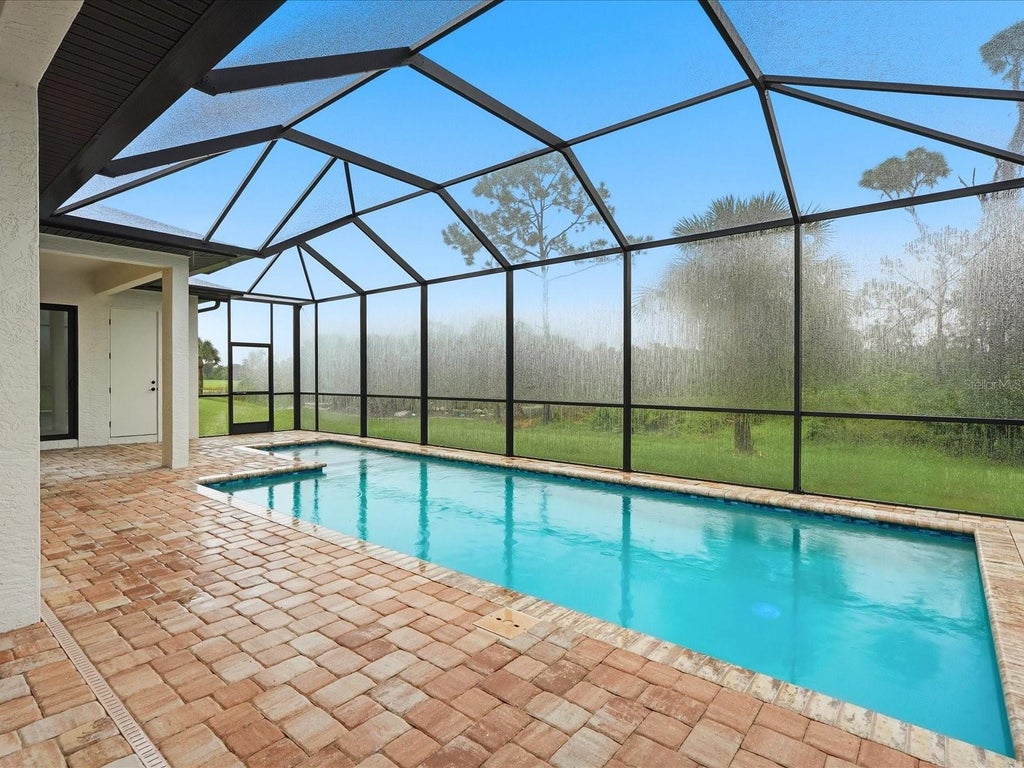 Photo of 51 Long Meadow Place, Rotonda West, FL 33947 (MLS # C7531675)