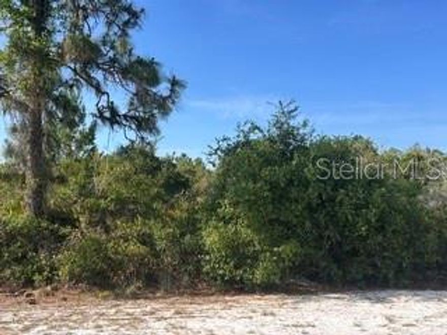 Each parcel in Indian Lake Estates has unique characteristics and deserves its own description. This ACRE lot is your perfect off-grid property! Pay electric only and dig well and install septic, for a low maintenance home. This rare listing is for two lots together, for a total of 1 acre. There is plenty of room to build a house (you can even keep the lots separated and build one for you and one for a friend!) and have a tree buffer on both sides of your home for privacy. The property faces NORTH, so you will have cool days since the sun rises and sets over the house, not in the front or back. The roads are private, so drive your golf cart to the clubhouse for a round of golf. Pay your ANNUAL community licensing fee for 2026 of $396.27 per parcel to help maintain community amenities, and you can play the 3-par, 9-hole executive course for free EVERY DAY. The primary 18-hole course is designed by Gary Cobb and is public and affordable. As you begin to plan your future in Florida, consider living a serene and private life in this neighborhood of Indian Lake Estates (informally, ILE). But don’t think it is all sunsets. The active community offers concerts, karaoke and trivia nights, weekly card games, bingo, movie nights, a book club, and pickleball and tennis courts, just to name a few. The community clubhouse also has a restaurant open 7 days a week, complete with bar. There is an additional bakery/eatery in the community, along with storage facilities in the commercial district. Indian Lake Estates is a perfect balance of privacy and activity. Call your agent and builder today and start planning!