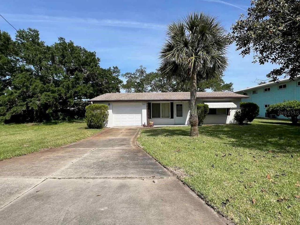 Photo of 535 S Peninsula Avenue, New Smyrna Beach, FL 32169 (MLS # NS1081307)