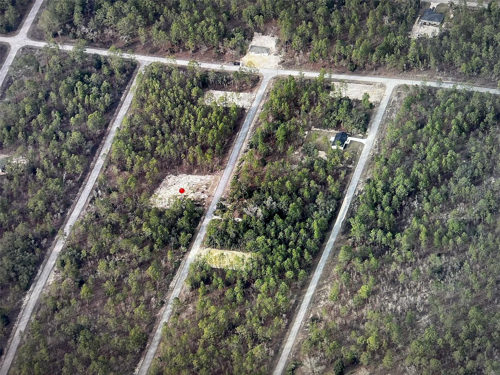 Build your dream home on this CLEARED VACANT LOT with mature trees lining the perimeter for privacy and natural beauty. This spacious lot offers flexibility with no HOA restrictions, giving you the freedom to design and use the property as you wish. Located near established homes, the lot provides a peaceful setting while still being close to shopping, schools, and major roadways. An additional neighboring lot is also available for purchase, making this a great opportunity to expand your space or invest in future growth.