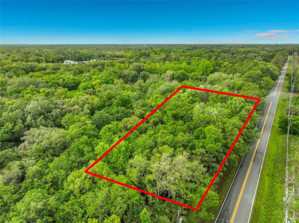 Photo of 4011 S Mellonville Avenue, Sanford, FL 32773 (MLS # O6398824)