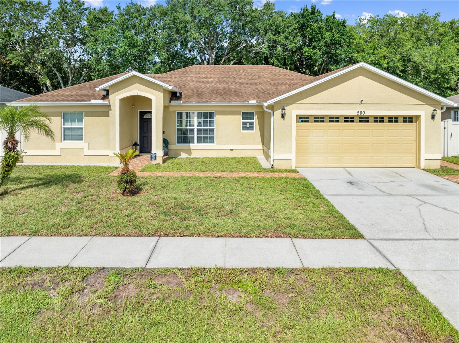 Spacious 4 Bedroom, 2 Bath Single-Family Home in Cypress Woods
Welcome to this beautifully updated 4-bedroom, 2-bath home offering 1,734 sq. ft. of living space, situated on an 8,145 sq. ft. lot. Built in 1996 and located in the desirable Cypress Woods community, this home combines modern upgrades with everyday comfort and efficiency.
Interior Features:
Fully renovated kitchen with granite countertops, modern cabinetry, and updated lighting
Remodeled bathrooms with granite vanities and contemporary tile finishes
22" tile flooring throughout the main living areas—durable and easy to maintain
Upgraded laundry room with storage and updated fixtures
Nest thermostat for smart temperature control
Updated lighting fixtures throughout
Epoxy-coated garage floor for enhanced durability and easy maintenance
Exterior & Security Features:
Screened and fenced rear porch—great for entertaining
Low-maintenance backyard with artificial turf and pavers
Front and rear irrigation system
Fully fenced yard for added privacy
Leafless gutters for improved drainage
Ring alarm system and outdoor speakers
Community & Location:
Located in Cypress Woods, a well-maintained neighborhood with sidewalks and landscaped lots
Close to Poinciana Lake Plaza and close to schools, parks, dining, and major roadways
Easy access to Orlando attractions
Low monthly HOA
Don't miss your chance to own this move-in ready home in one of Poinciana's most sought-after neighborhoods!