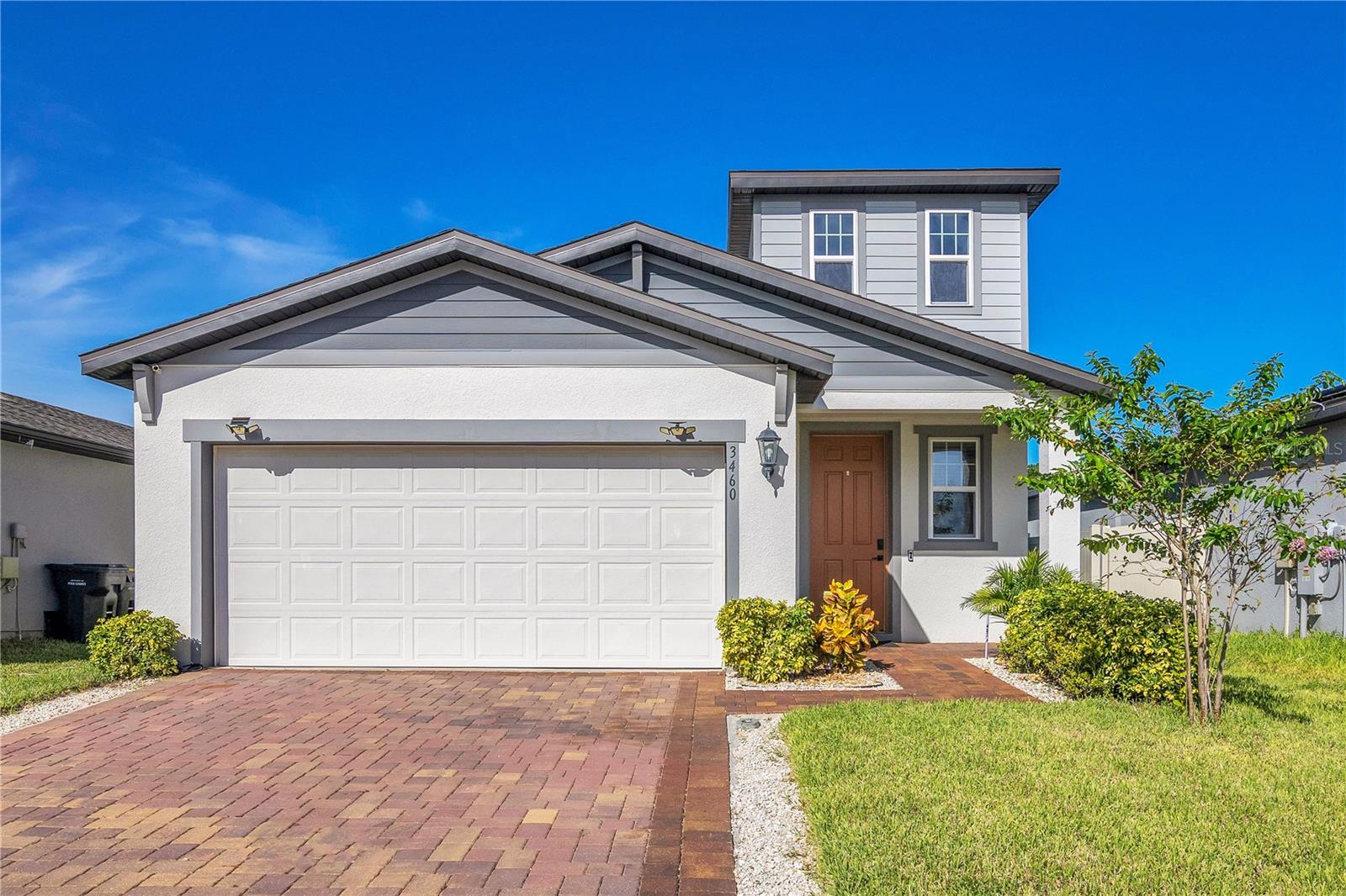 Welcome to 3460 Monaco Lane, a beautiful 4-bedroom, 2.5-bath energy-efficient home built in 2021 in the desirable Tuscan Meadows community, offering low HOA fees, a refreshing pool, and a playground. With 2,167 SqFt of modern living space, this residence features an open floor plan with a kitchen showcasing 42" cabinets, granite countertops, stainless steel appliances, a spacious island with seating, pantry, and accent lighting, all flowing seamlessly into the dining and living areas with access to the fenced backyard. The first-floor primary suite includes a spa-like ensuite with dual sinks, walk-in shower, private water closet, linen storage, and walk-in closet, complemented by a half bath, laundry, storage under the stairs, and a two-story foyer. Upstairs, a versatile loft anchors three additional bedrooms, a full bath with granite dual sinks, and another linen closet. Outdoors, enjoy a pavers extended patio, and a peaceful neighborhood with sidewalks and streetlights. Ideally located in Davenport, this home is just minutes from Disney World, ChampionsGate golf courses, Posner Park shopping and dining, AdventHealth medical facilities, top-rated schools, and quick access to I-4 and Hwy 192, connecting you easily to Orlando, Tampa, and all of Central Florida’s attractions. This move-in-ready home is waiting for you—schedule your showing today!