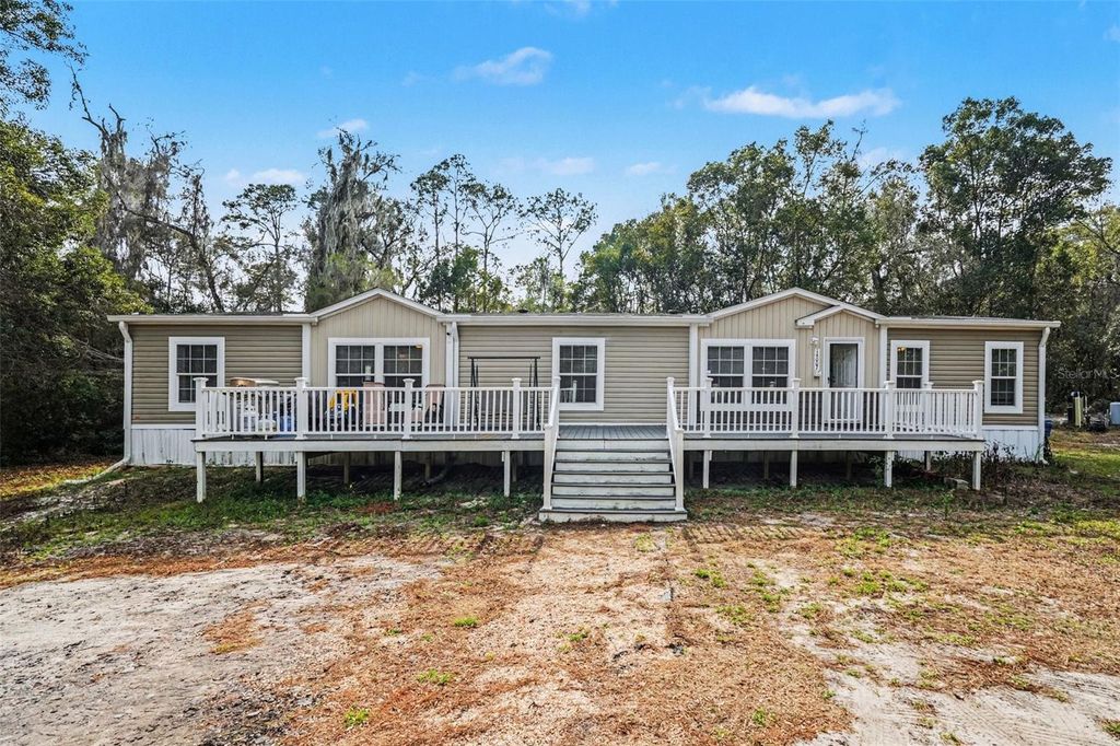Photo of 14007 Snow Memorial Highway, Brooksville, FL 34601 (MLS # OM719777)