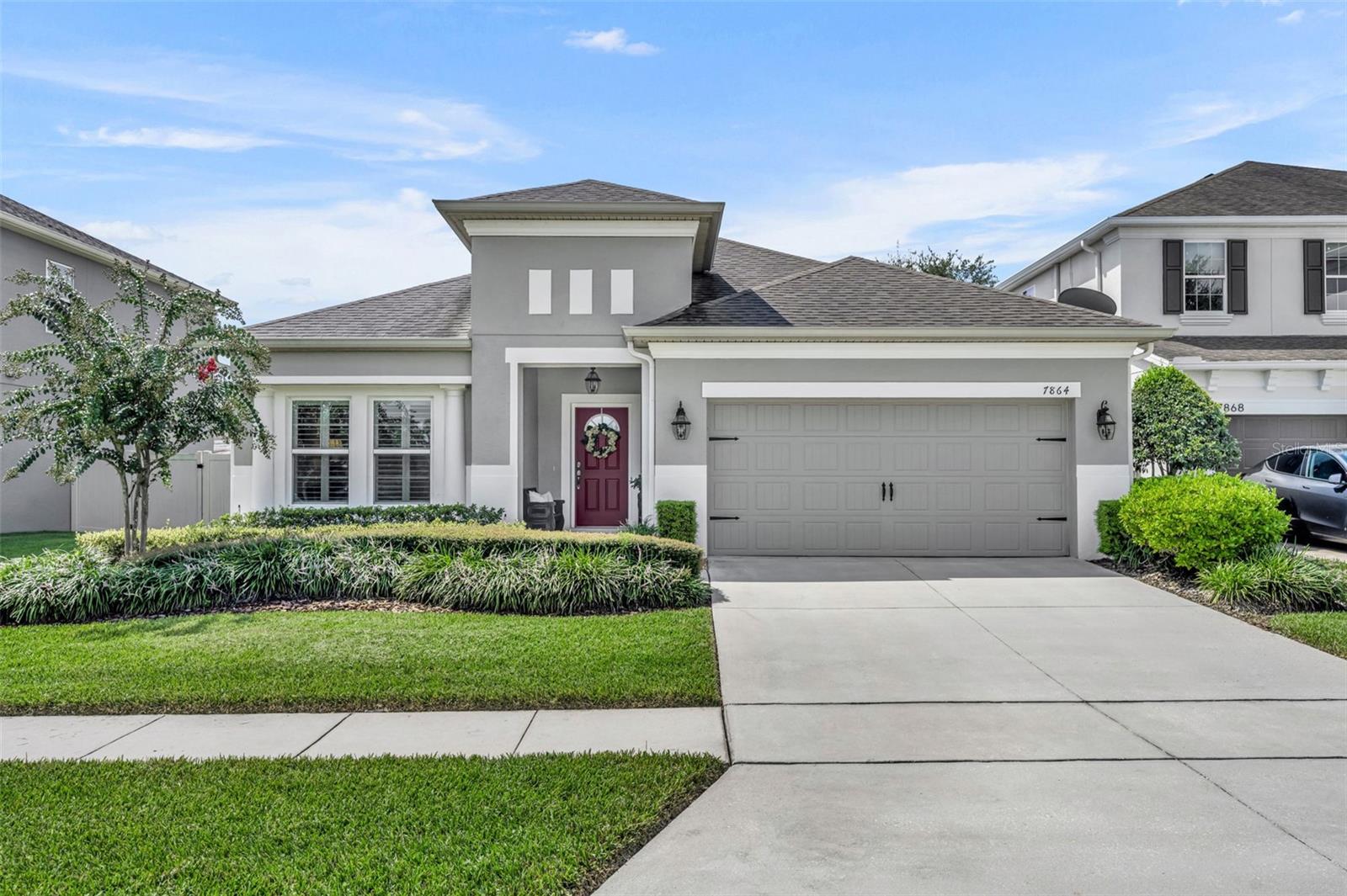 Located in the gated community of Enclave at Aloma, this immaculate 4-bedroom / 2.5-bath home impresses with a functional, 3-way split bedroom floorplan, screened rear lanai, and an additional sitting area/flex space off the Primary bedroom with (2) additional built-in closets that truly sets this home apart. Meticulously maintained, this fabulous home features tons of post-build upgrades and improvements, including a fully landscaped property with a private, fenced backyard, engineered hardwood flooring, plantation shutters, upgraded light fixtures and ceiling fans, and bright, neutral interior paint for a fresh and airy feel throughout.
Enter to a cozy foyer that welcomes you with gorgeous, rich engineered hardwood floors, leading past a convenient powder bath and into the large living space at the rear of the home where a spacious kitchen/living/dining combo makes entertaining a breeze. The open kitchen features granite countertops and stainless steel appliances, with a newer (2023) GE refrigerator and upgraded Bosch dishwasher, plus a walk-in pantry, and an island with a breakfast bar for added seating & prep space.
Large windows with timeless plantation shutters line the rear wall, framing views of the Magnolia trees and lush backyard, while French doors off the dining area offer easy access to the screened rear lanai for outdoor lounging.
The large Primary Suite extends to include an extra sitting room, with access to the screened lanai and (2) additional built-in closets that make it perfect for a quiet office space or dressing area. The en-suite Primary bathroom offers a modern stone countertop with dual sinks, plus a private water closet, linen closet, and a large walk-in closet.
Just left of the front foyer sits 2 secondary bedrooms and a full hall bath, and to the right you’ll find the 4th bedroom, great for guests or a private office, and a laundry room with an upgraded front-loading washer and dryer, built-in upper cabinets, and a pull-out drying rack. The 2-car garage with a handy utility sink is accessible off the foyer.
Experience the perfect blend of privacy and convenience in this gated community, just minutes from 417 & 436, and around the corner from Target, Costco, and numerous shops and restaurants. Ask for a floorplan and list of improvements!