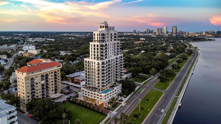 Introducing the fully furnished 2201-Penthouse unit at Hyde Park House, an unparalleled condominium on Bayshore Boulevard in the heart of Historic Hyde Park, South Tampa. This luxurious top-floor residence features sweeping panoramic views of Hillsborough Bay, Hyde Park, and the vibrant downtown Tampa skyline. Access the 22nd floor via a private elevator and enter a grand, 5,258-square-foot living space designed for both relaxation and entertaining.

This exceptional penthouse offers an open floor plan, enriched by six balconies that provide stunning vistas for enjoying sunrises and sunsets. The residence boasts 11-foot ceilings and includes four bedrooms, five and a half bathrooms, a den, a study, wet bars, walk-in closets, and additional storage. The owner has thoughtfully installed electronic shades over every window and sliding glass door, and each closet is equipped with high-end custom cabinetry.

Inside, the penthouse is adorned with large porcelain tile floors, European cabinetry, and quartz countertops. The chef's kitchen is a culinary masterpiece, featuring Gaggenau appliances, a gas cooktop, and a walk-in pantry. The spacious laundry room is fitted with front-load Electrolux washers and dryers, along with ample storage space.

Hyde Park House is a highly sought-after residence with 22 floors and 72 private units. Residents enjoy exclusive amenities including a 24-hour concierge, private secured parking, access-controlled building and elevators, and climate-controlled storage. Ideally located near Tampa International Airport, shopping, dining, downtown Tampa, Davis Island, Harbor Island, and the dynamic Water Street district, this penthouse offers both luxury and convenience in a prime location