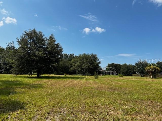 Calling all builders, investors, developers!!! This 2.5-acre parcel of high and dry vacant land presents an
exceptional opportunity for your next project. Cleared, level, and maintained, this property is primed for
immediate development with minimal preparation needed. Mature oak trees on property. Well and electricity
with meter base on property. Easy access to SR-429, 1 mile from Wyld Oaks development. Lot size 311 x
258.