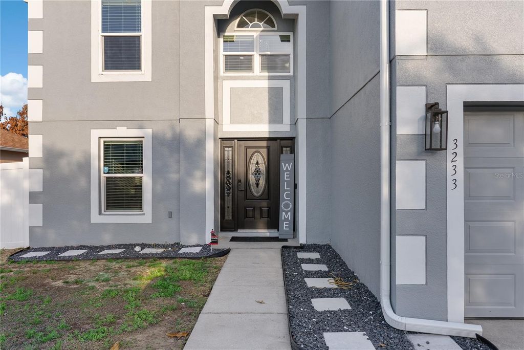 Photo of 3233 White Blossom Lane, Clermont, FL 34711 (MLS # O6389029)