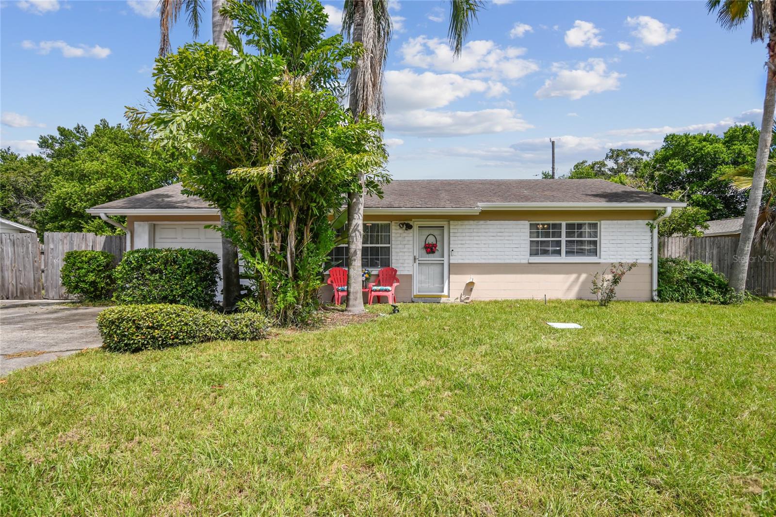 One or more photo(s) has been virtually staged. Move-In Ready Home on Oversized Lot in Prime Fern Park/Maitland Location - Welcome to this beautifully updated 2-bedroom, 1-bath single-family home located in the heart of Fern Park/Maitland. With 850 square feet of comfortable living space, a 1-car garage, and sitting on an oversized, fully fenced lot, this property offers privacy, functionality, and charm. Step inside to an open-concept layout with tile flooring in the main living areas and durable laminate in the bedrooms. The remodeled kitchen (2019) features granite countertops and mostly stainless steel appliances, perfect for home chefs and entertainers alike. The bathroom was tastefully updated in 2018 with granite finishes as well. Major systems have been thoughtfully upgraded: a new A/C (2019), water heater (2021), septic drainfield (2025), and a fully updated irrigation system with fresh sod (2025). Enjoy relaxing evenings on the screen-enclosed back porch or take advantage of the huge powered shed with A/C, ideal for a workshop, studio, or additional storage. Additional highlights include an enclosed indoor laundry room, extra driveways (including one behind the fence for secure parking), an outdoor shower, and GE electric panel. Located just minutes from Magnolia Park with walking trails, playground, tennis court, and dog-friendly spaces. Enjoy easy access to I-4, top employers, shopping, dining, and attractions like Disney, SeaWorld, New Smyrna Beach, and Daytona Beach.Don’t miss this opportunity to own a centrally located, well-maintained home with room to grow!