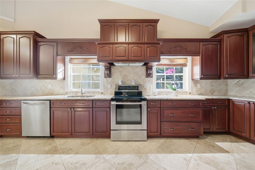 Photo of 2170 Oak Forest Lane, Palm Harbor, FL 34683 (MLS # TB8447765)