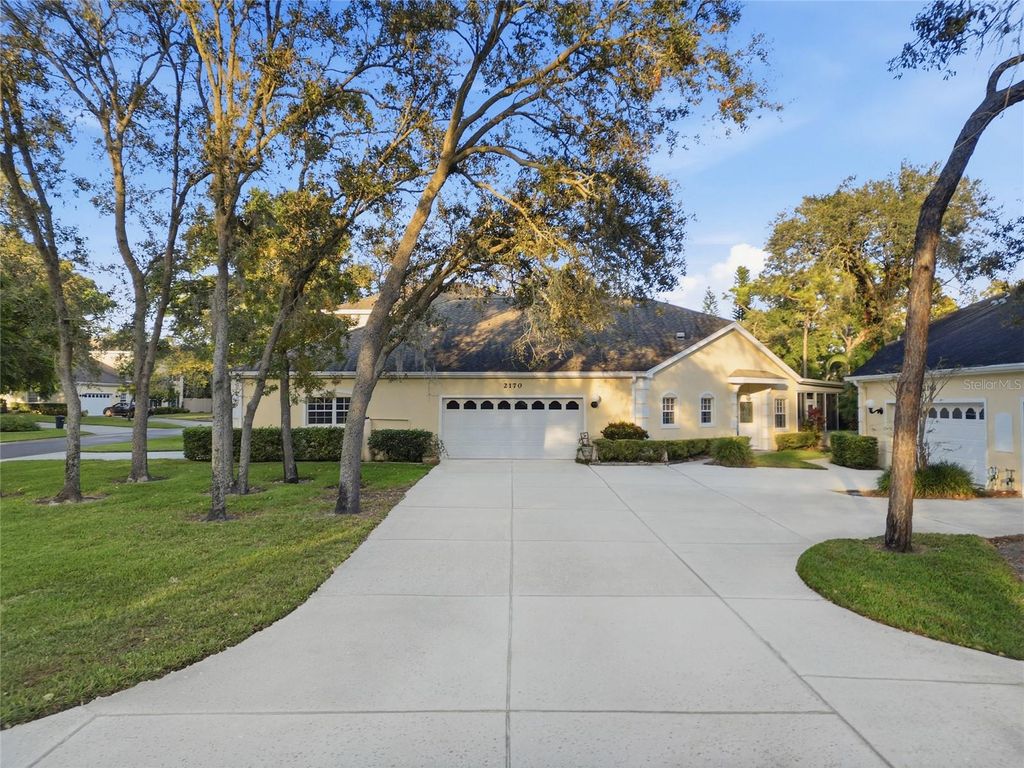 Photo of 2170 Oak Forest Lane, Palm Harbor, FL 34683 (MLS # TB8447765)