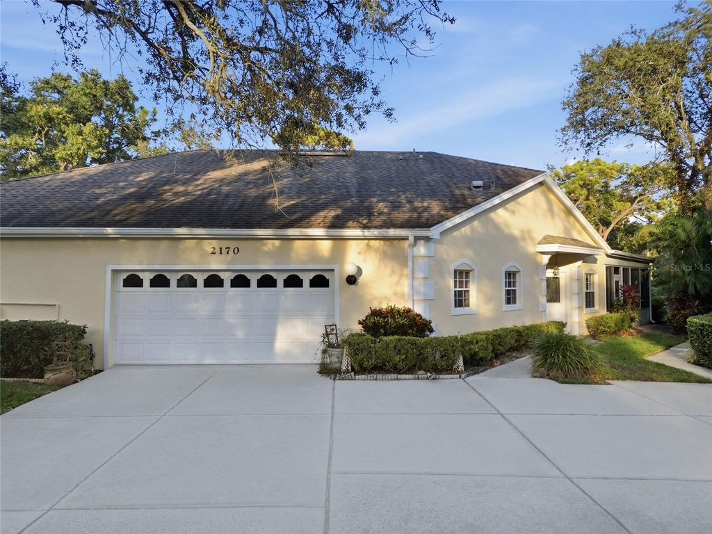 Photo of 2170 Oak Forest Lane, Palm Harbor, FL 34683 (MLS # TB8447765)