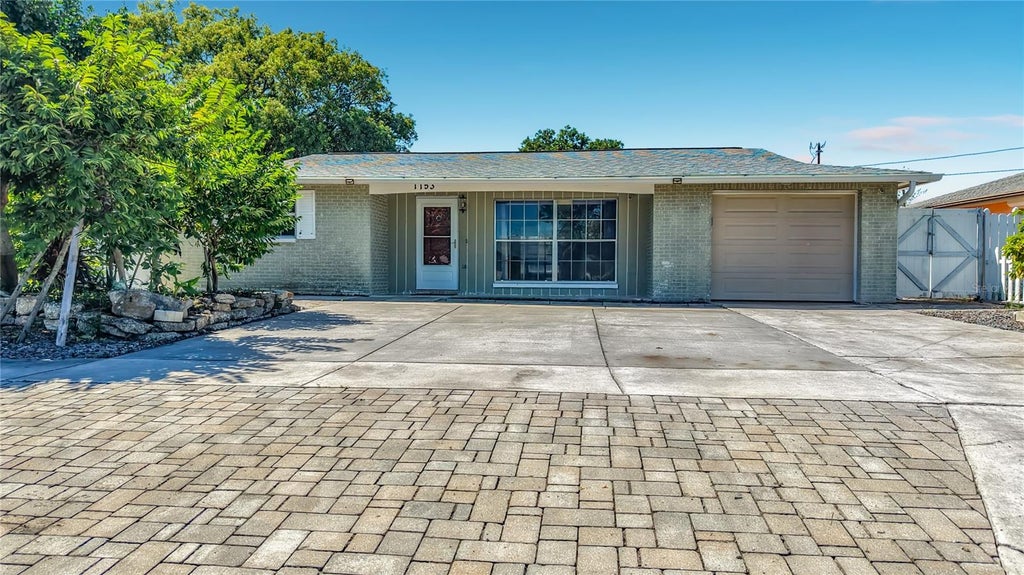 Photo of 1153 Chancellor Drive, Holiday, FL 34690 (MLS # TB8558245)