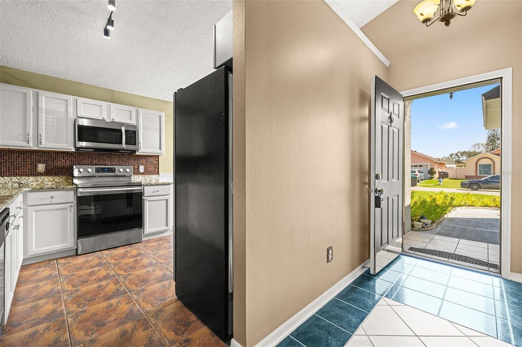 Photo of 11830 Sindlesham Court, Orlando, FL 32837 (MLS # S5158727)