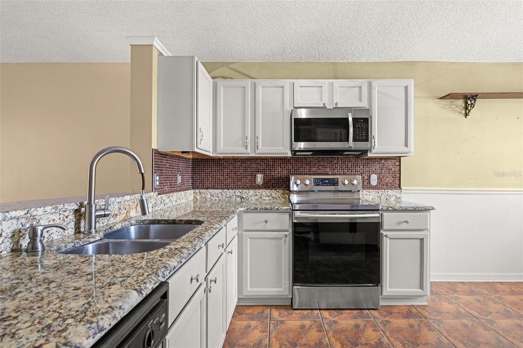 Photo of 11830 Sindlesham Court, Orlando, FL 32837 (MLS # S5158727)