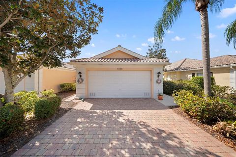 Photo of 5566 Modena Place, Sarasota, FL 34238 (MLS # A4686933)