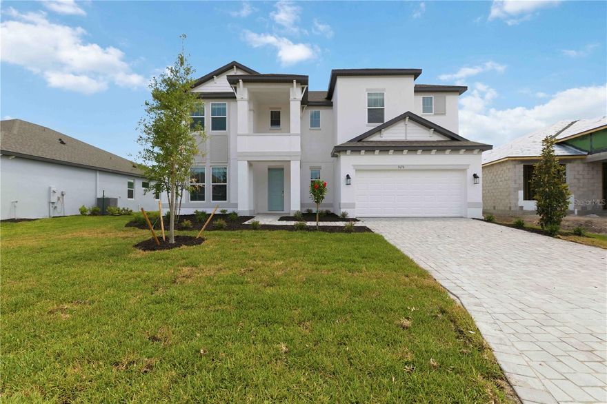 Welcome to The Madison by MI Homes at Creek’s Edge at Twin Rivers — a home that truly checks all the boxes, and honestly, Parrish has seen nothing like this. With 5 bedrooms, 4 bathrooms, and a spacious two-story layout, this one offers the perfect blend of elegance, comfort, and everyday functionality.

The first floor is beautifully designed for both everyday living and entertaining, with a defined dining room and a gourmet kitchen featuring gorgeous finishes, premium cabinetry, and a large island that naturally becomes the heart of the home. Large sliding glass doors lead out to the lanai, making it easy to enjoy peaceful Florida evenings and bring the outdoors in. There is also a first-floor bedroom and full bathroom, making this layout ideal for multigenerational living or guests. Hurricane impact windows add safety, security, and energy efficiency throughout the home.

Upstairs, the owner’s suite is a true retreat with plenty of room to unwind, along with double vanities and a private water closet. You’ll also find three additional bedrooms, two full bathrooms, and a flexible bonus space that could easily serve as a playroom, home office, media room, or second living area. One of the bedrooms features its own ensuite bath, and all include walk-in closets. Luxury tile in the owner’s suite adds even more style, class, and ambiance.

And then there is the lifestyle. Located in Twin Rivers, this home offers the space so many buyers are craving, with larger homesites, a more spread-out feel, and a community known for its natural beauty, custom feel, and strong sense of neighborhood. Twin Rivers is loved for its winding roads, mature scenery, and the kind of setting that gives you room to breathe while still being close to everything Parrish has to offer.

Every inch of The Madison feels spacious, elevated, and thoughtfully designed for the way people really live today. Stylish, functional, and incredibly inviting, this is the kind of home that stands out — and truly, Parrish has seen nothing like it.