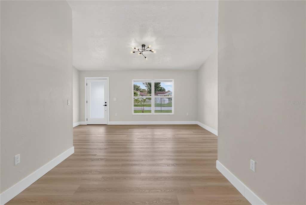 Photo of 380 Buttonwood Drive, Kissimmee, FL 34743 (MLS # O6435222)