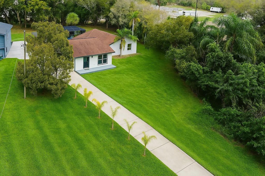 Photo of 20 2nd Avenue SE, Lutz, FL 33549 (MLS # TB8363017)