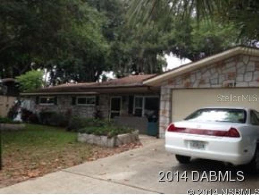 Enjoy this lovely 3 bedroom, 2 bath home in very desirable and established neighborhood of Port Orange. Move in condition includes new paint inside and out, new carpet, updated bathrooms, newer windows, air and roof. Spacious living and family rooms for entertaining. Lush landscaping with private fenced backyard. this is a must on your list! All information recorded in the MLS is intended to be accurate but cannot be guaranteed. CEILING FANS NOT WARRANTED. ;Water: City