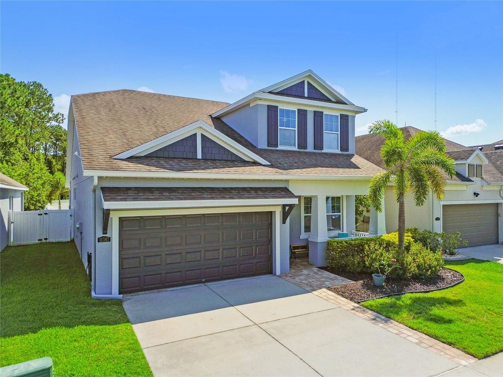 Photo of 11307 Quiet Forest Drive, Tampa, FL 33635 (MLS # A4685595)