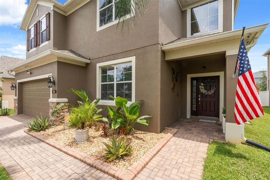 Photo of 648 Cortona Drive, Orlando, FL 32828 (MLS # O6430163)