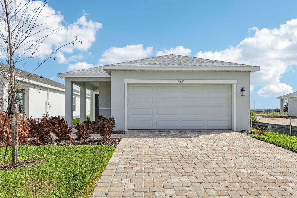 Photo of 329 Meredith Boulevard, Winter Haven, FL 33881 (MLS # O6342366)