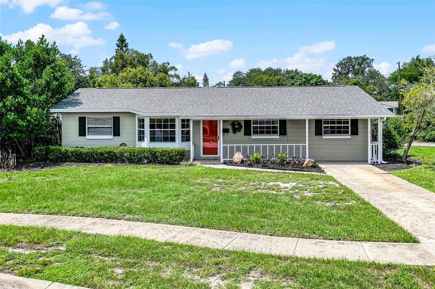 Nestled in a welcoming neighborhood in Brentwood Heights sits a beautiful corner lot home showcasing timeless, classic features with vintage charm. A large, welcoming space perfect for entertaining, with a wall that beautifully showcases family photos, heirlooms, or artwork. Both bathrooms are equipped with safety railings in the showers. A cozy seated area near the entrance, perfect for relaxing with morning coffee. The well kept, vintage style kitchen includes appliances in great condition. Located right past the kitchen, the laundry room features a stylish black-and-white checkered floor and direct access to the backyard. One bedroom opens directly to the lanai, providing an easy transition to outdoor living. Two sheds convey with the property, plus additional parking is available on the north side of the home.