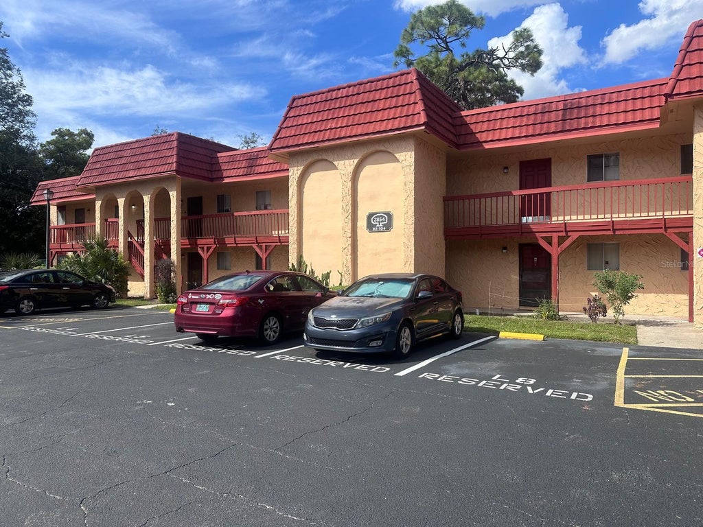 Photo of 2854 N Powers Drive #102, Orlando, FL 32818 (MLS # O6451040)