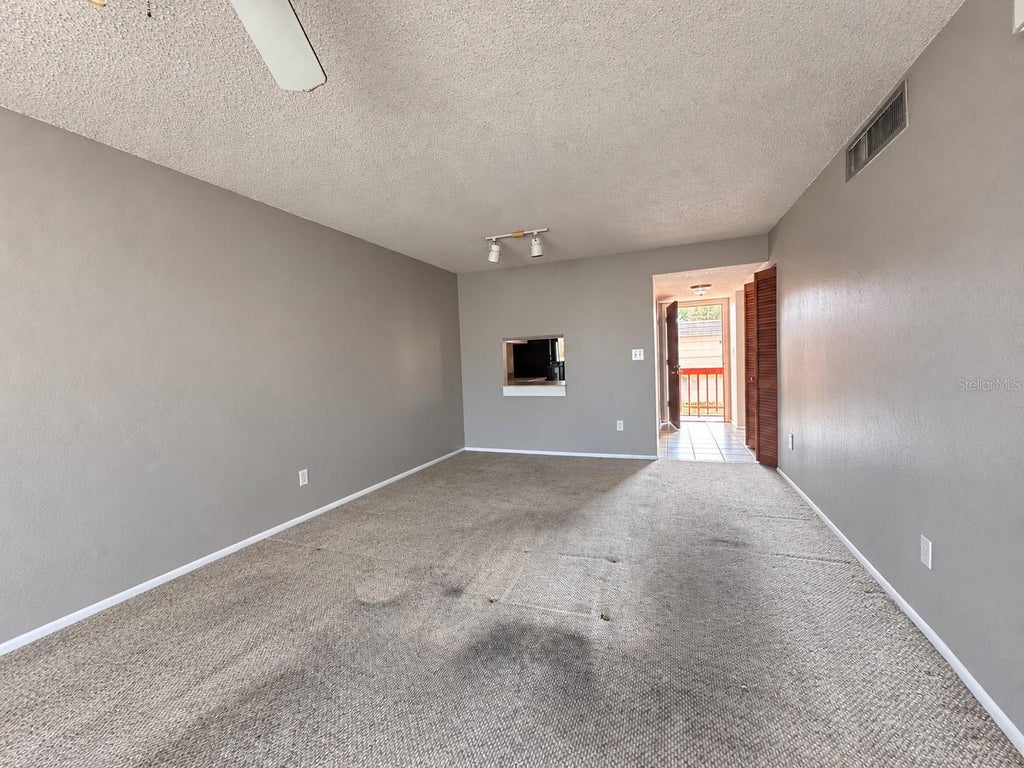 Photo of 2854 N Powers Drive #102, Orlando, FL 32818 (MLS # O6451040)