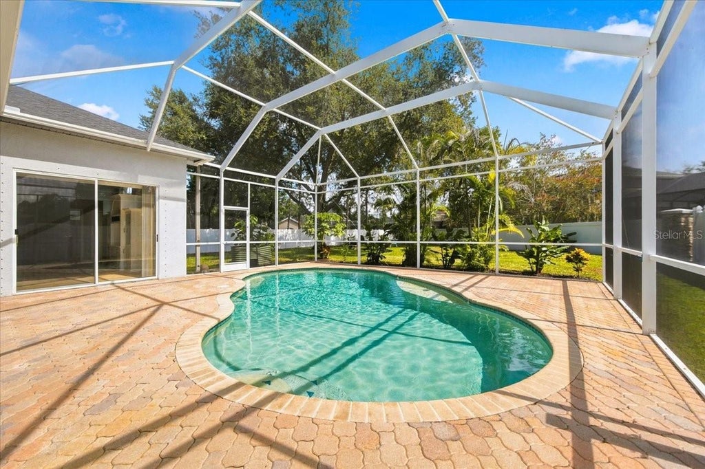 Photo of 15019 Lake Emerald Boulevard, Tampa, FL 33618 (MLS # TB8550716)