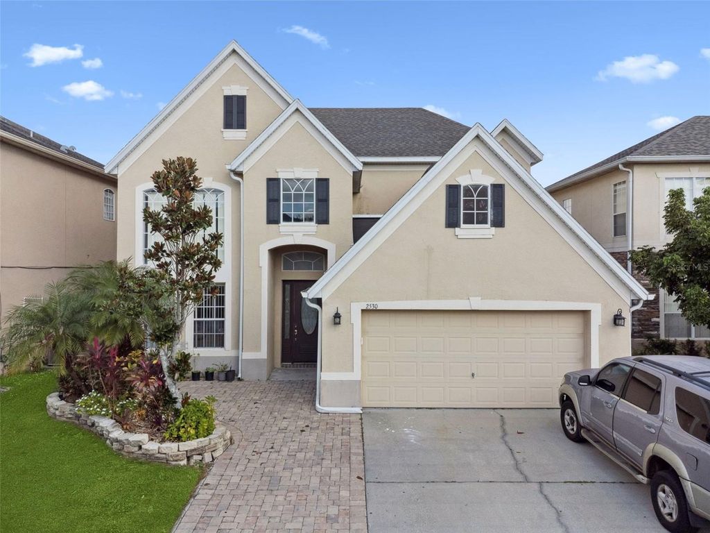 Photo of 2530 Sand Arbor Circle, Orlando, FL 32824 (MLS # O6354990)