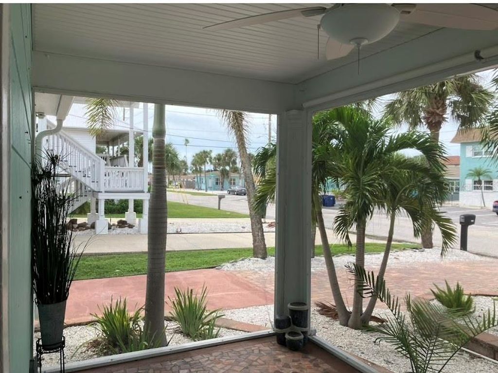 Photo of 7625 Coquina Way, St Pete Beach, FL 33706 (MLS # TB8432713)